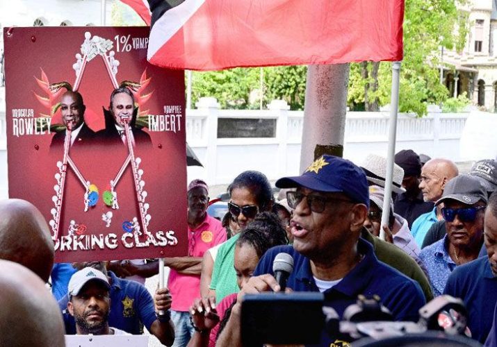 SOLIDARITY: President of the Joint Trade Union Movement Ancel Roget addresses union members and attendees at yesterday’s protest at the Queen’s Park Savannah, Port of Spain, opposite Whitehall, to show their dissatisfaction with the Cabinet’s decision to accept the Salaries Review Commission’s Report to pave the way for wage increases for State officials. —Photo: JERMAINE CRUICKSHANK