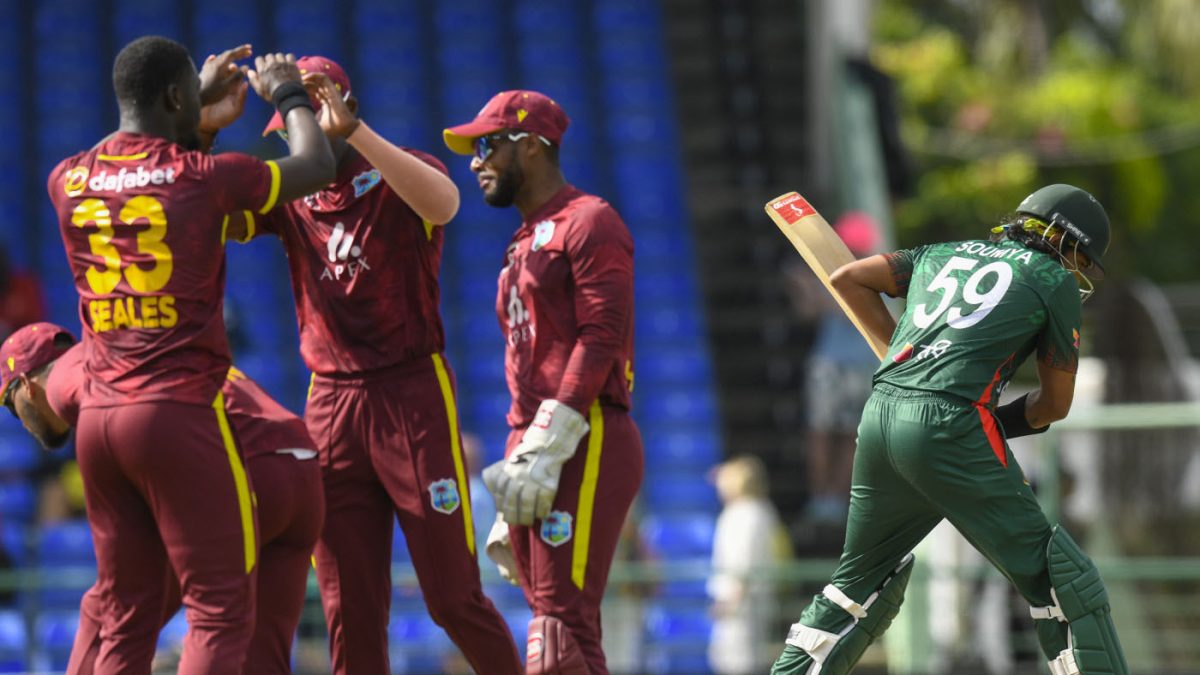 Jayden Seales celebrates with teammates after dismissing Soumya Sarkar for two (CWI Photo)