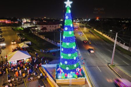 The lighted three 70-foot Christmas tree at Rahaman’s Corner (Drone photo by Mass Drones)