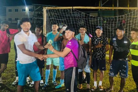 The victorious Akawini team collected their winnings from the tournament organiser, Ramesh Lyte.
