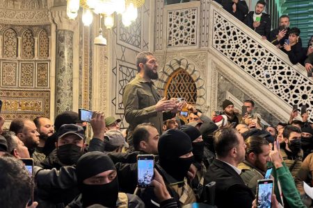 Top rebel commander Abu Mohammed al-Golani speaks to a crowd at Ummayad Mosque in Damascus, after Syrian rebels announced that they have ousted President Bashar al-Assad, Syria December 8, 2024.