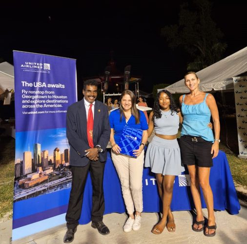 L-R - GlobalTT CEO Waynewright Orderson, United Airlines Country Manager Bettina Carvajal Leon, winner of the return ticket and US Ambassador Nicole Theriot
