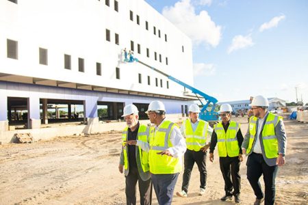  Minister of Health,  Dr Frank Anthony (centre in foreground), joined by visiting medical professionals, Dr Alan Landay and Dr Matt Mendoza of the University of Texas Medical Branch, yesterday visited the Enmore Regional Hospital and the Paediatric and Maternity Hospital Construction sites.  (Ministry of Health photo)
