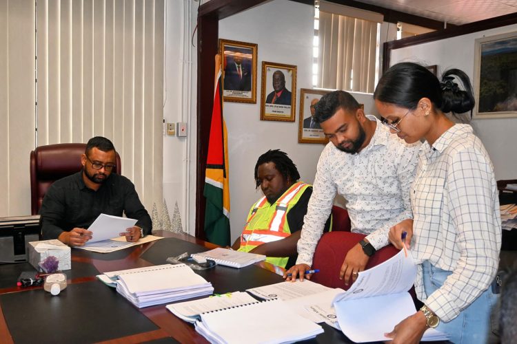 One of the contracts being signed (Ministry of Home Affairs photo)