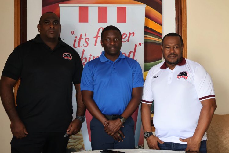 L-R: Petra Organisation’s Nolan Bernard, Scout Narada Wilson
and Petra Co-Director Troy Mendonca at the announcement yesterday. 
