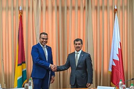 Guyana’s Foreign Secretary, Robert Persaud (left), and Secretary-General, Ministry of Foreign Affairs of Qatar, Dr Ahmed bin Hassan Al Hammadi (DPI photo)
