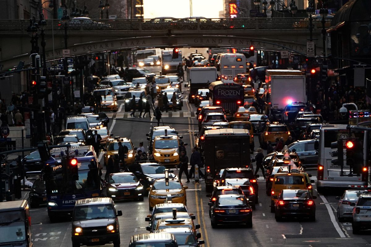 Traffic is pictured at twilight along 42nd St. in the Manhattan borough of New York, U.S., March 27, 2019. REUTERS/Carlo Allegri/File Photo 