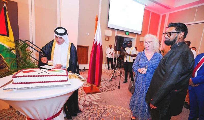 President Irfaan Ali (right)  at the Qatar National Day reception at the Marriott Hotel on Monday night.  Acting Charge d’ Affaires in the Embassy of the State of Qatar, Mohammed Ebrahim Al Rumai is at left. (Office of the President photo)