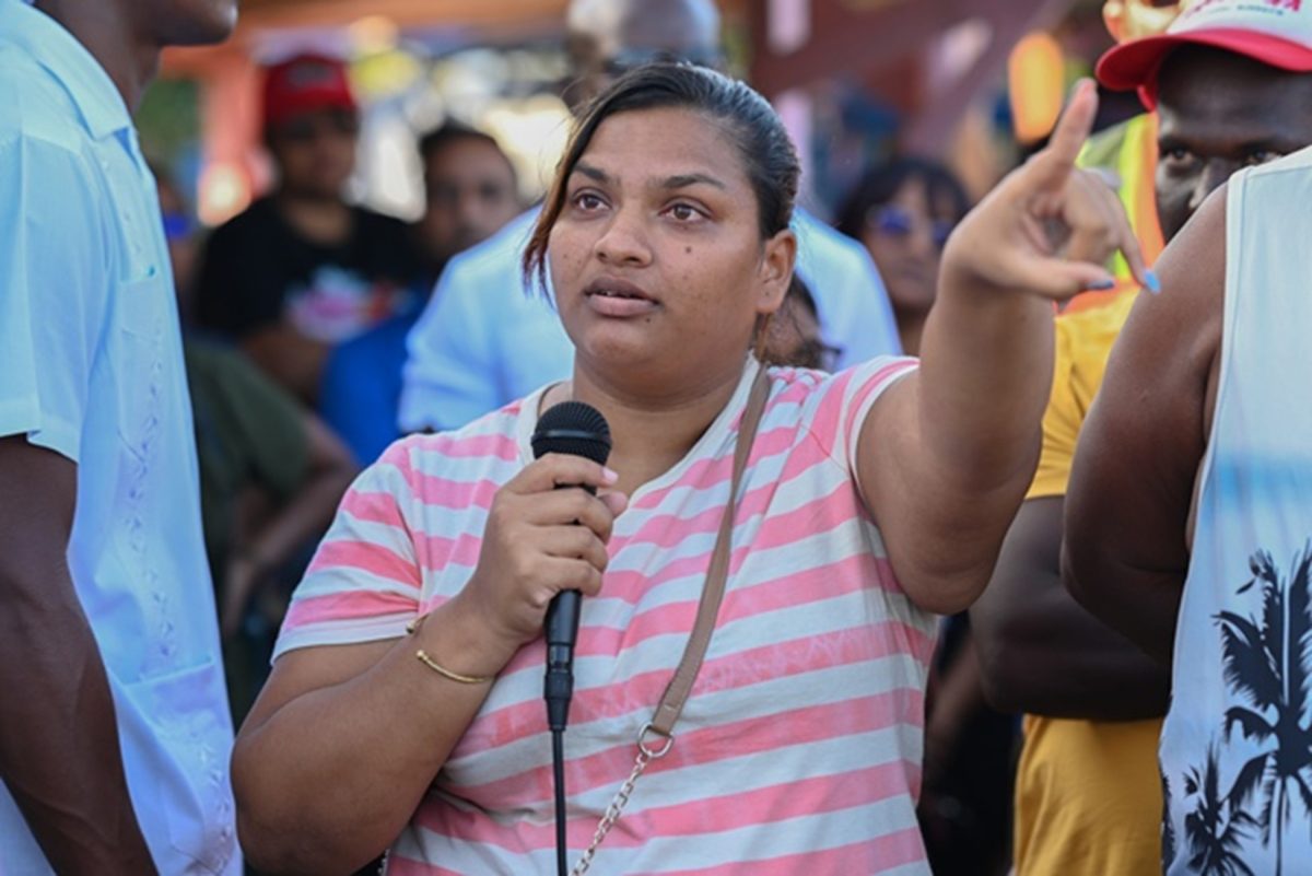 A resident expressing her concerns to President Irfaan Ali (DPI photo)