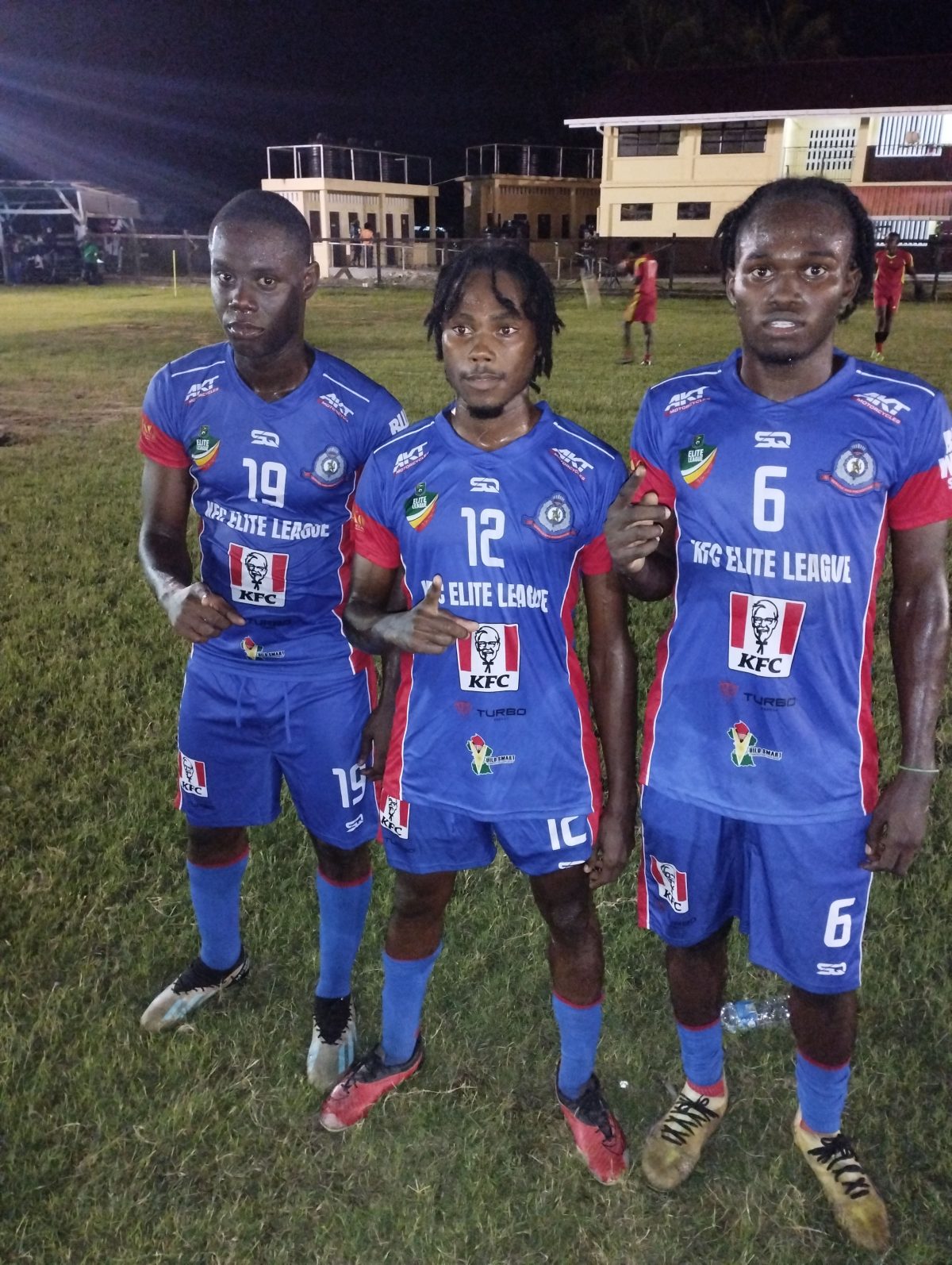 Police scorers from left: Adrian Aaron, Dorwin George, and Devon Padmore
