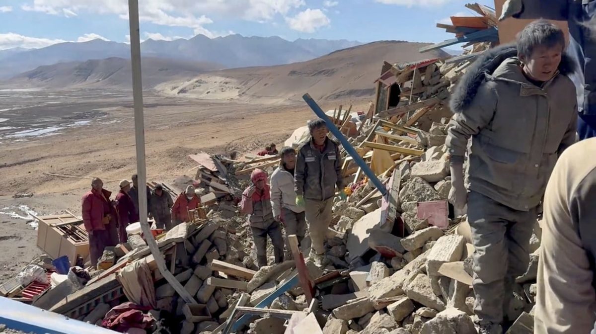 Rescue teams work amidst rubble in the aftermath of an earthquake in a location given as Shigatse City, Tibet Autonomous Region, China, in this screengrab obtained from a handout video released on January 7, 2025. Tibet Fire and Rescue/Handout via REUTERS 