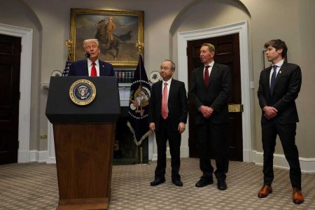 U.S. President Donald Trump delivers remarks on AI infrastructure, next to Oracle co-founder Larry Ellison, SoftBank CEO Masayoshi Son and OpenAI CEO Sam Altman at the Roosevelt room at White House in Washington, U.S., January 21, 2025. REUTERS/Carlos Barria 