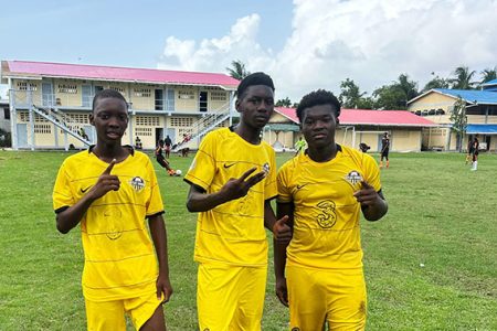 The Uitvlugt goalscorers with
hatrick hero Morkel Dainty (centre)