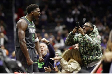 Washington, District of Columbia, USA; Minnesota Timberwolves guard Anthony
Edwards (5) celebrates after scoring while being fouled against the Washington Wizards in
the fourth quarter at Capital One Arena. Mandatory Credit: Geoff Burke-Imagn Images