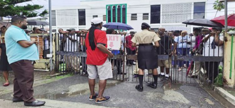 Pensioners at the NIS office at Brickdam were unsure of where they should collect their cash grant cheque. 