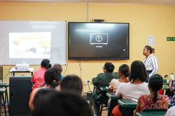 Minister of Education, Priya Manickchand (right) at the school yesterday (Ministry of Education photo)