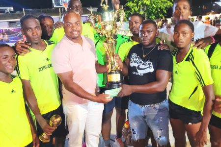 Flashback! Winners of the last Mashramani Street Football Championship, Stabroek Ballers posed for a photo with SMI’s Edison Jefford.