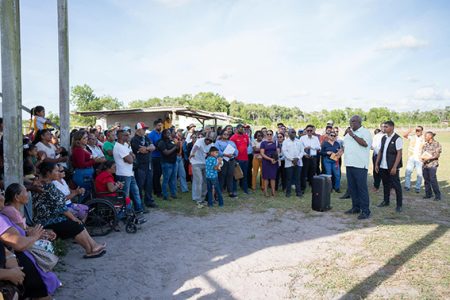 Prime Minister Mark Phillips addressing residents of Laluni (Office of the Prime Minister photo)
