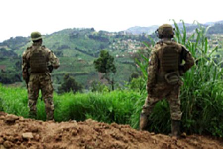 Members of the Armed Forces of the Democratic Republic of the Congo (FARDC) stand guard against the M23 rebel group in Lubero, North Kivu province of the Democratic Republic of Congo October 27, 2024.