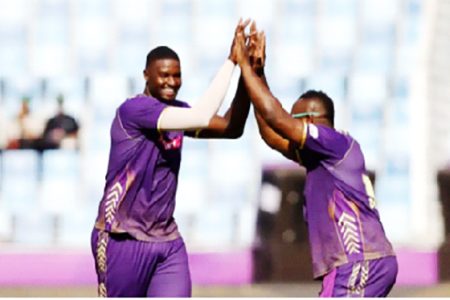 Jason Holder celebrates