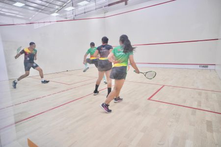 Squash players testing the new court (Irfaan Ali Facebook page)
