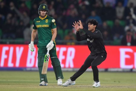 Rachin Ravindra, who was monumental with the bat following an imperious 108, is in the process of catching Aiden Markram for 31 (ESPN Cricinfo Photo)