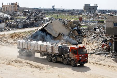 A truck carrying aid drives, amid a ceasefire between Israel and Hamas, in Rafah in the southern Gaza Strip, February 16, 2025. REUTERS/Hatem Khaled/File Photo