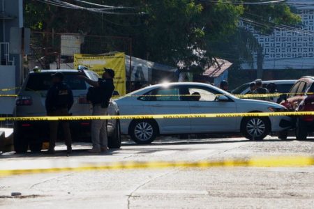 Security authorities work at the crime scene where the former head of the highest court in Mexico's Guerrero state, Judge Edmundo Roman Pinzon, was gunned down in his car outside the Palace of Justice, in Acapulco, Mexico December 11, 2024. REUTERS/Javier Tinoco