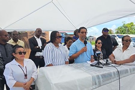 The group during the press conference yesterday. Terrence Campbell is holding the microphone 