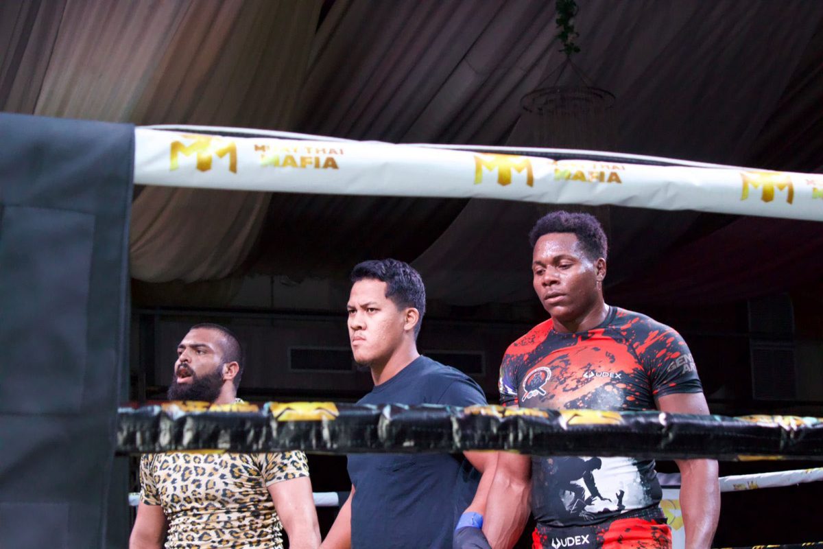 Guyana’s Ryan Cox (right) had to settle for second place in the Brazilian Jiu Jitsu category of the Muay Thai Mafia II tournament.