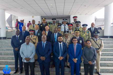 Regional police commissioners and government officials. President Irfaan Ali is at centre in the front row.