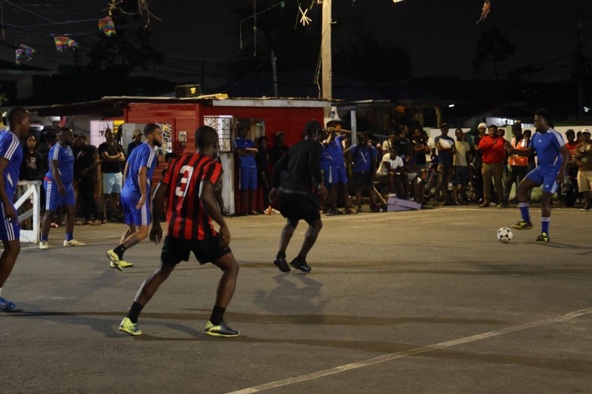 Action in the ‘Settlement of all Arguments’ Street-ball Championship at the Back Circle Tarmac.