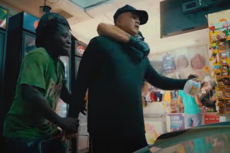 Another scene from the ‘Chiney’ music video depicting the bandits emptying the supermarket shelves
