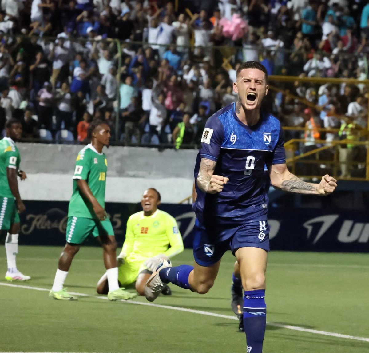 Nicaragua’s striker Jaime Moreno celebrates after sticking a
rebound into the back of Guyana’s net. (CCC/ Jairo Cajina photo)
