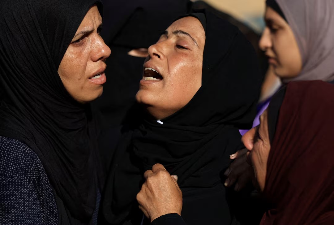 Israeli fire kills 140 in Gaza in 24 hours, medics say, as attention