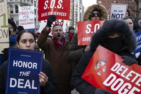 People protest outside Jacob K Javits federal building against the firings of thousands of federal workers by Trump and Doge in New York City, on 19 February. Photograph: Anadolu/Getty Images