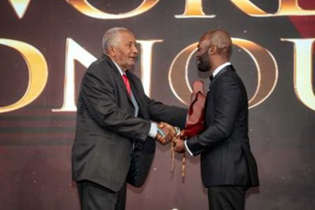 Sir Andy Roberts, left, and CWI president Dr Kishore Shallow