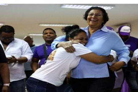 Suriname’s opposition leader Jennifer Geerlings-Simons of the National Democratic Party (NDP) celebrates with supporters as she proclaims herself the winner of the presidency as counting continues during the National Assembly election, in Paramaribo, Suriname, May 26, 2025.