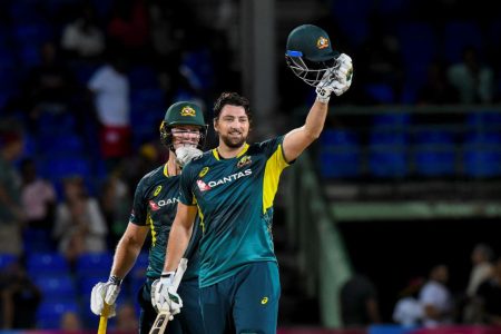 Tim David celebrates the fastest T20I century by an Australian off 37 balls. (Getty Images)
