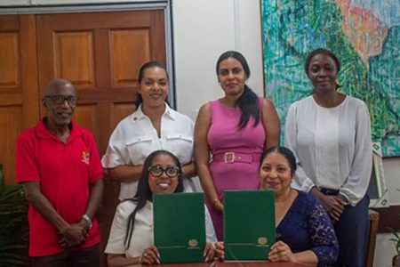 Sitting from left:  Chair of the European Chamber of Commerce (Guyana) Dr Alista Bishop and Vice-Chancellor of the University of Guyana Professor Paloma Mohamed Martin; standing from left: Registrar of the University of Guyana Dr Nigel Gravesande, Chair of the Cultural Exchange and Community Engagement Committee at the Chamber Kerri Gravesande-Bart, Senior Philanthropy Officer, Philanthropy, Alumni and Civic Engagement Trovana Azeez, and Deputy Vice-Chancellor of Institutional Advancement Dr Mellissa Ifill