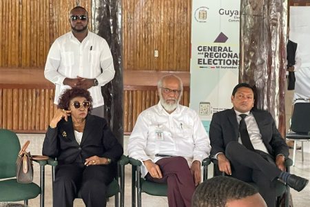 Seated from left observing the Nomination Day proceedings yesterday were GECOM Chair Claudette Singh and government-appointed commissioners Clement Rohee and Manoj Narayan.