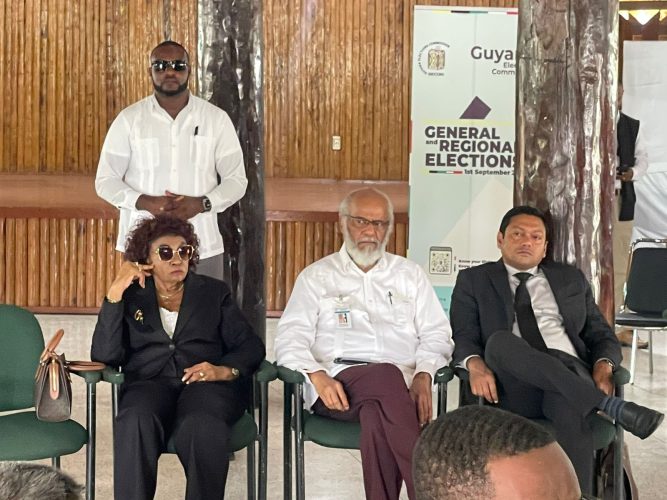 Seated from left observing the Nomination Day proceedings yesterday were GECOM Chair Claudette Singh and government-appointed commissioners Clement Rohee and Manoj Narayan.