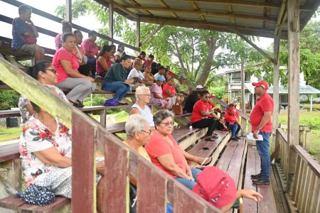 Minister of Housing and Water Colin Croal engaging the residents 
