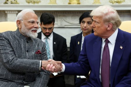 U.S. President Donald Trump and Indian Prime Minister Narendra Modi shake hands, at the White House in Washington, D.C., U.S., February 13, 2025. REUTERS/Kevin Lamarque/File Photo 