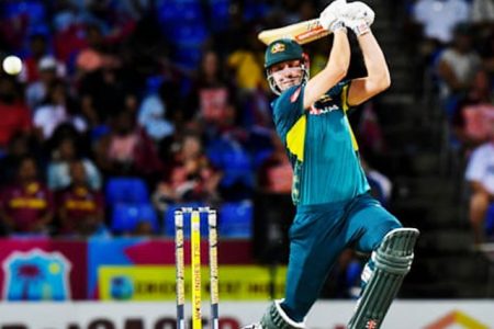 Cameron Green of Australia hits a four during the fifth and final T20 internationalagainst West Indies in Basseterre. Photograph: Randy Brooks/AFP/Getty Images