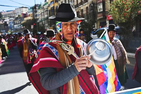 An Aymara man bangs an empty utensil in a symbol of protest, as the country faces one of its worst economic crises in a long time, pushing Bolivian Indigenous voters away from the ruling party, in La Paz, Bolivia June 2, 2025. REUTERS/Claudia Morales/File photo 