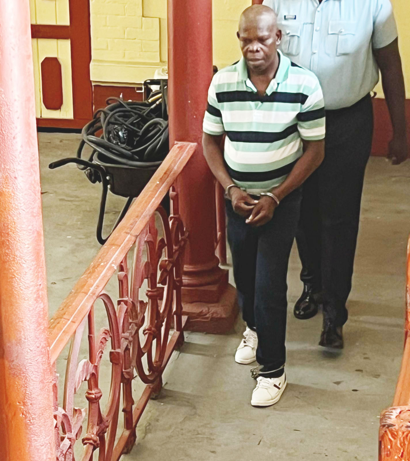 Businessman charged with breaching protection order