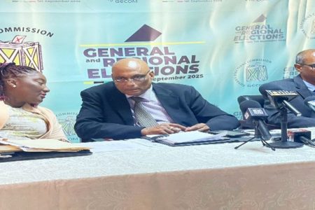 From left are GECOM PRO Yolanda Ward, Chief Election Officer (CEO) Vishnu Persaud and Deputy  CEO Aneal Giddings