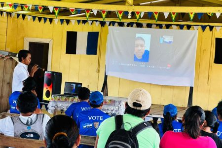 Azruddin Mohamed conducting a meeting virtually