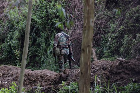 A member of the M23 rebel group walks on the outskirts of Matanda in eastern Democratic Republic of Congo, March 22, 2025. REUTERS/Zohra Bensemra/File Photo